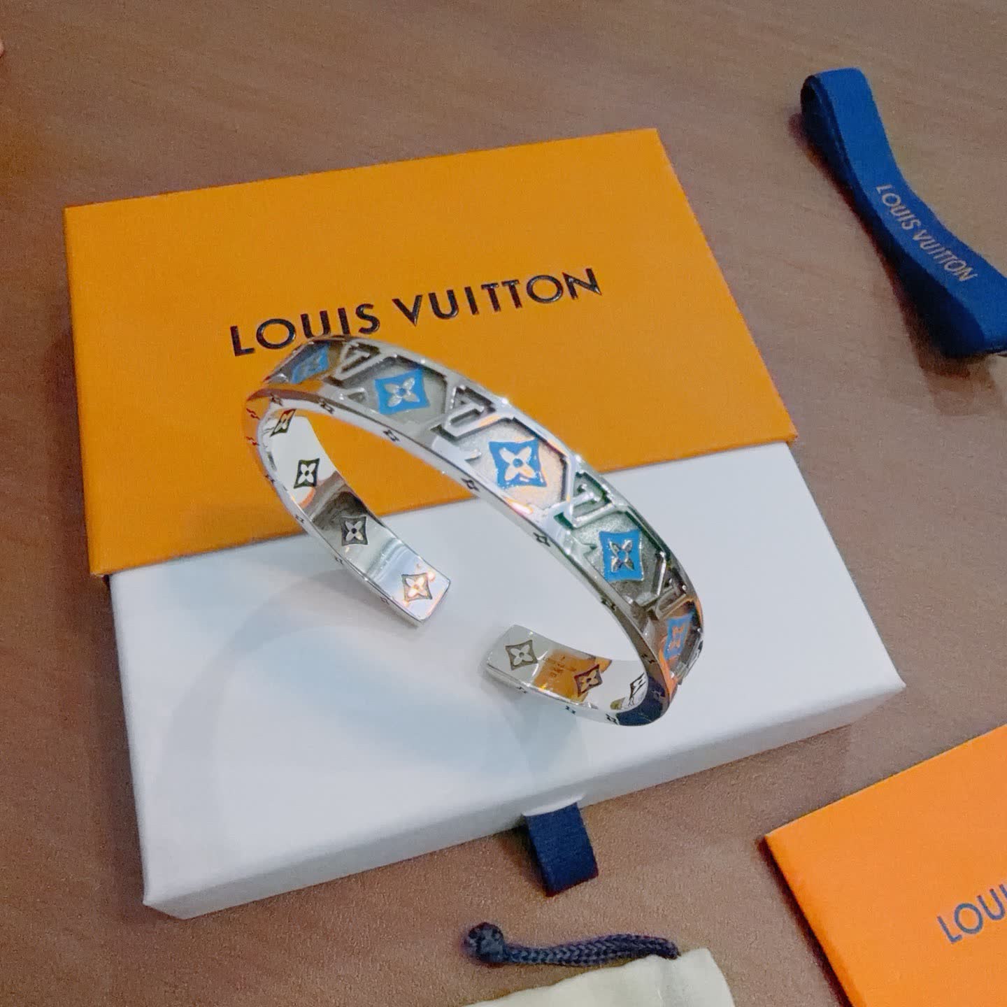 Louis Vuitton Silver Bracelet with Blue and Orange Accents